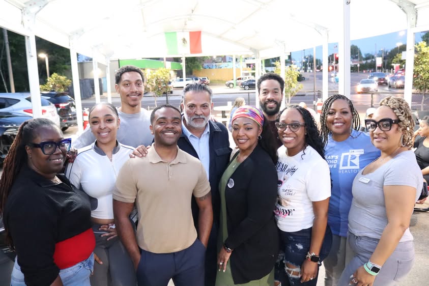 KAIZEN agents together at a networking event