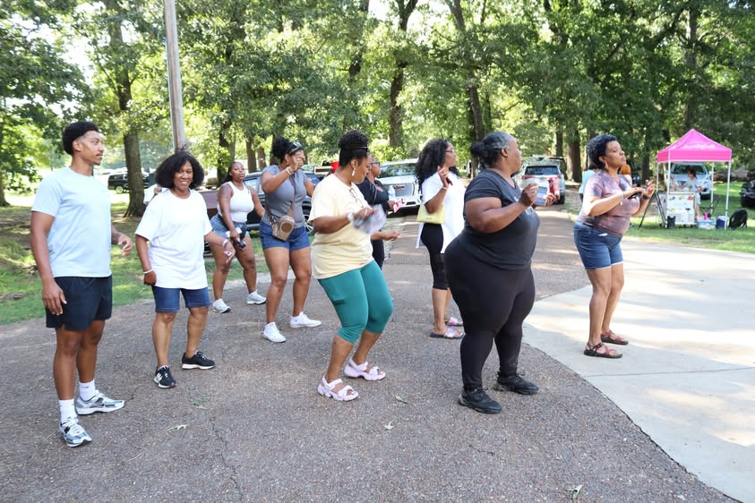 Line dancing at the KAIZEN Family & Friends Picnic